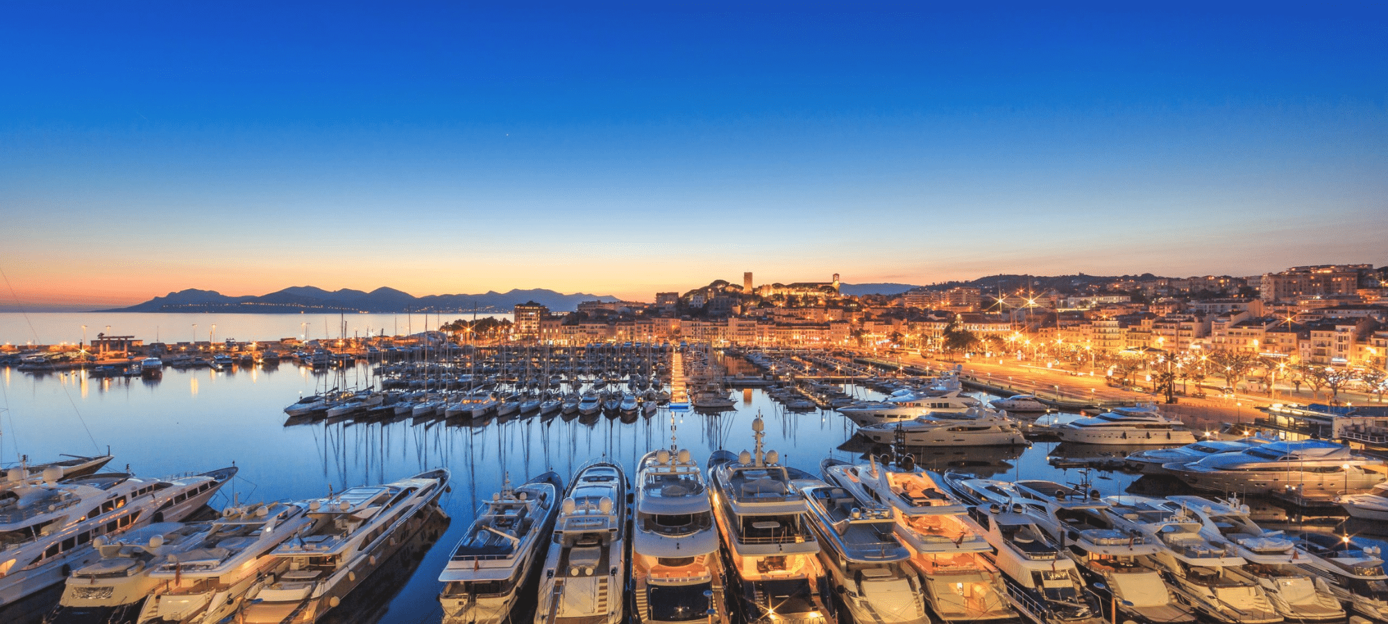 Cannes harbour at twilight